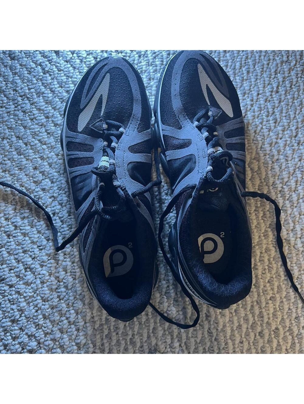 Black and white Brooks running shoes
